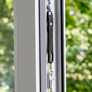 a fragment of a plastic window. accessories, handle, blinds